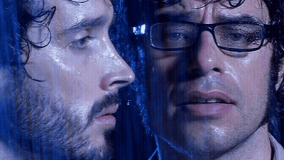 Man With Glasses And Beard Looking At Reflection GIF