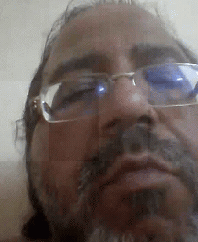 Man With Glasses And Beard Making Face GIF
