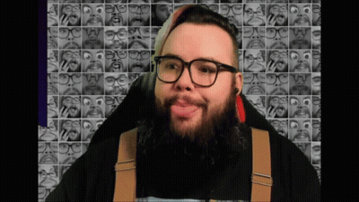 Man With Glasses And Beard Making Face GIF