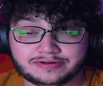 Man With Glasses And Beard Making Funny Face GIF