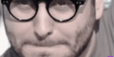 Man With Glasses And Beard Making Funny Face GIF