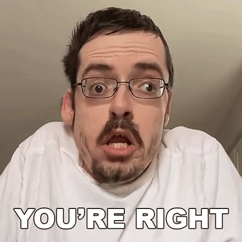 Man With Glasses And Beard Making Funny Face GIF