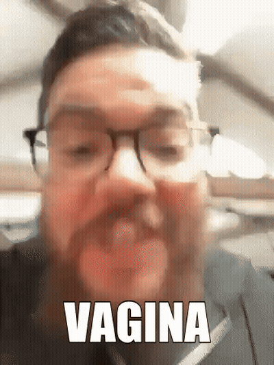 Man With Glasses and Beard Making Funny Face Saying Vagina