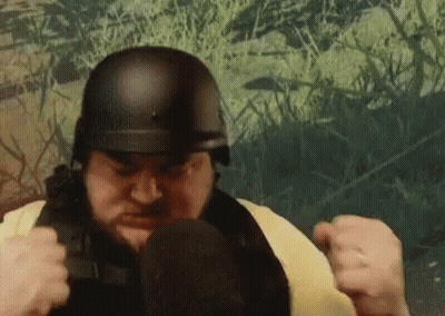 Man With Glasses And Beard Making Funny Face Saying Vagina GIF