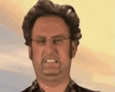 Man With Glasses And Beard Making Funny Face GIF