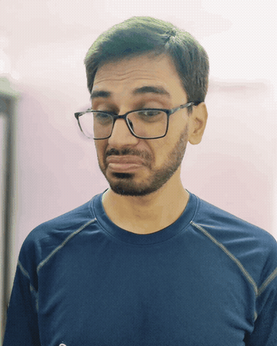 Man With Glasses And Beard Making Funny Face GIF