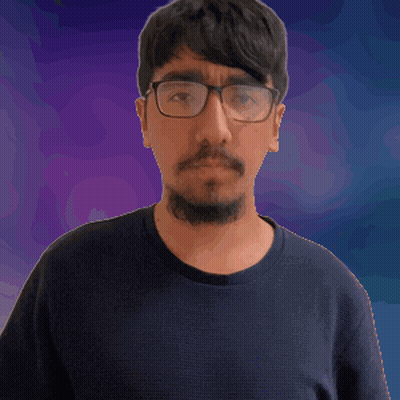 Man With Glasses And Beard Making Hand Gesture GIF