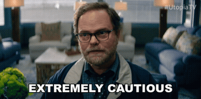 Man With Glasses And Beard Saying Extremely Cautious GIF