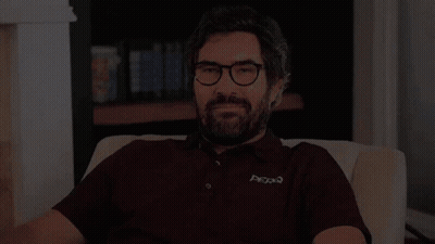 Man With Glasses And Beard Saying Hi There GIF