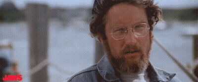 Man With Glasses And Beard Saying Jaws GIF