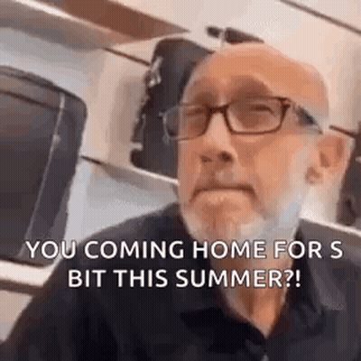 Man With Glasses And Beard Says Coming Home This Summer GIF