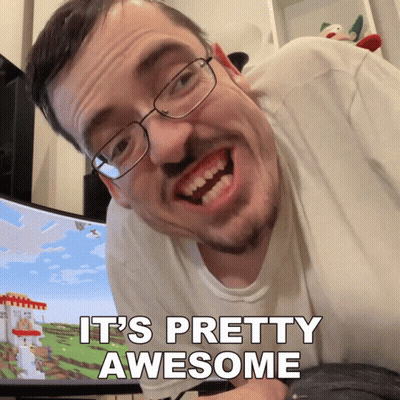 Man With Glasses And Beard Says It's Pretty Awesome In Front Of Computer Monitor GIF