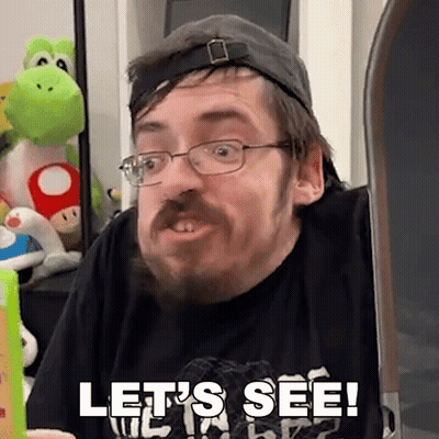 Man With Glasses And Beard Says Let's See GIF