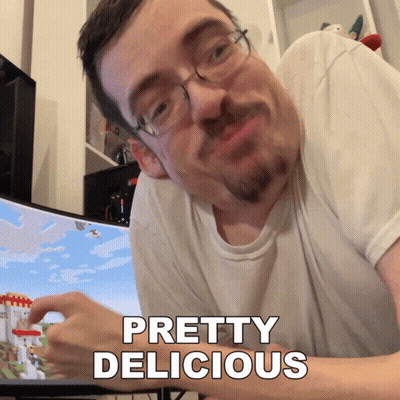 Man With Glasses And Beard Says Pretty Delicious GIF