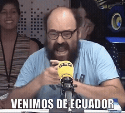 Man With Glasses And Beard Screaming Into Yellow Microphone GIF