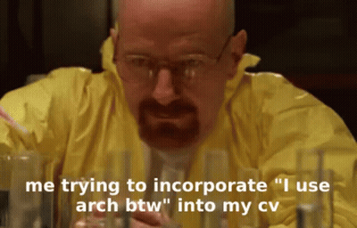 Man With Glasses And Beard Sitting With Straw In Mouth GIF