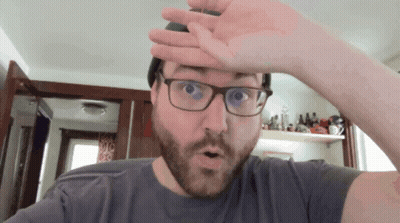 Man With Glasses And Beard Surprised Hand On Forehead GIF