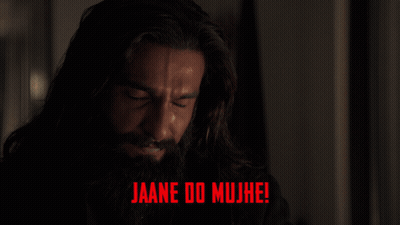 Man With Glasses And Beard Surrounded By It's Live Delicce Sign GIF