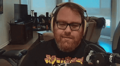Man With Glasses And Beard Wearing Headphones GIF