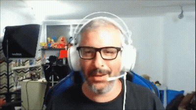 Man With Glasses And Beard Wearing Headphones And Microphone GIF
