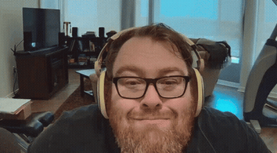 Man With Glasses And Beard Wearing Headphones GIF