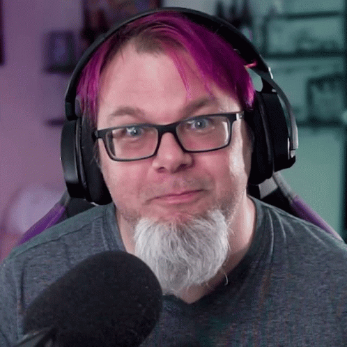 Man With Glasses And Beard Wearing Headphones GIF