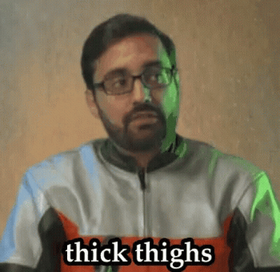 Man With Glasses And Beard Wearing Thick Thighs Shirt GIF