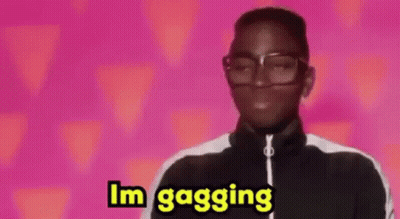 Man With Glasses And Black Jacket Smiling Im Gagging GIF