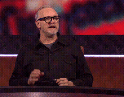 Man With Glasses And Black Shirt Saying Interesting GIF