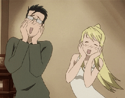 Man With Glasses And Blonde Woman Laughing GIF