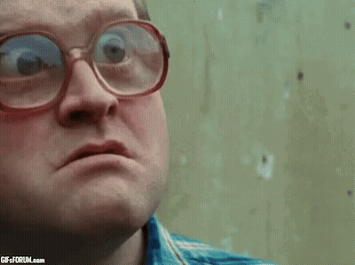Man With Glasses And Blue Shirt Making Funny Face GIF