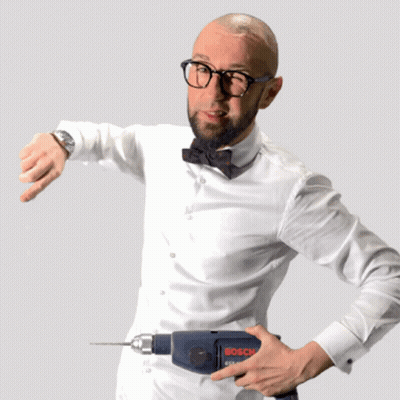 Man With Glasses And Bow Tie Holding Bosch Drill GIF