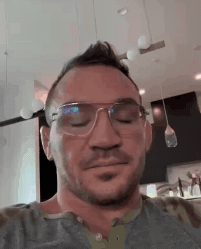 Man With Glasses And Camouflage Shirt Eyes Closed GIF