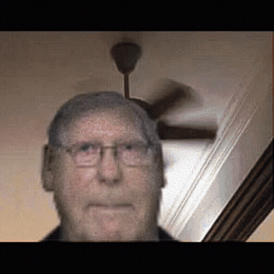 Man With Glasses And Ceiling Fan GIF