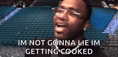 Man With Glasses And Chain Screaming In Empty Stadium GIF
