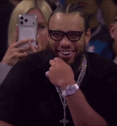 Man With Glasses And Cross Necklace Smiling GIF