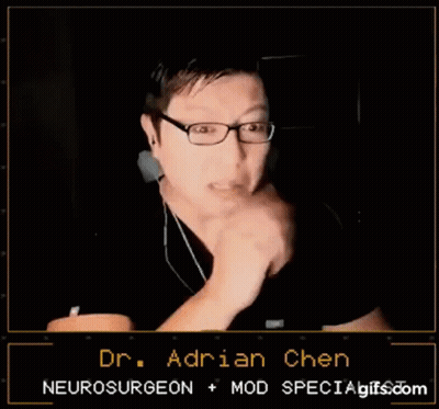 Man With Glasses And Ear Buds Talking To Dr. Adrian Chen GIF