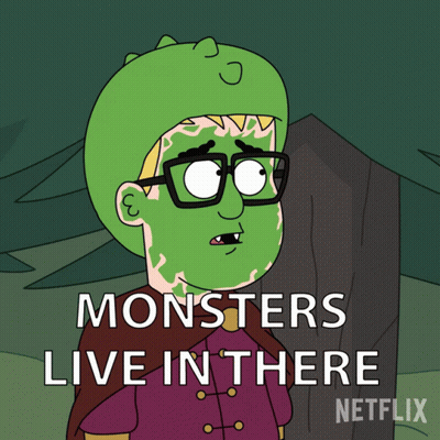 Man With Glasses And Green Mask Saying Monsters Live In There GIF