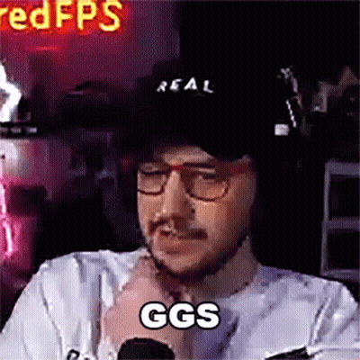 Man With Glasses And Hat At Microphone GIF