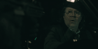 Man With Glasses And Hat Driving Car GIF