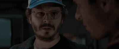 Man With Glasses And Hat Holding Cup Saying Monster GIF