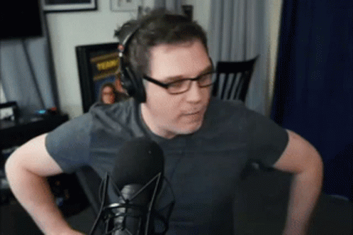 Man With Glasses And Headphones At Microphone GIF