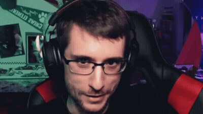 Man With Glasses And Headphones In Gaming Chair GIF