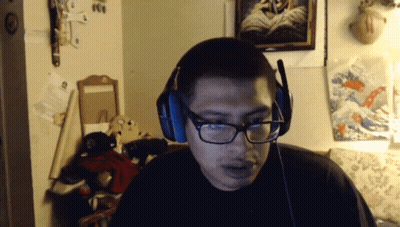 Man With Glasses And Headphones Looking GIF