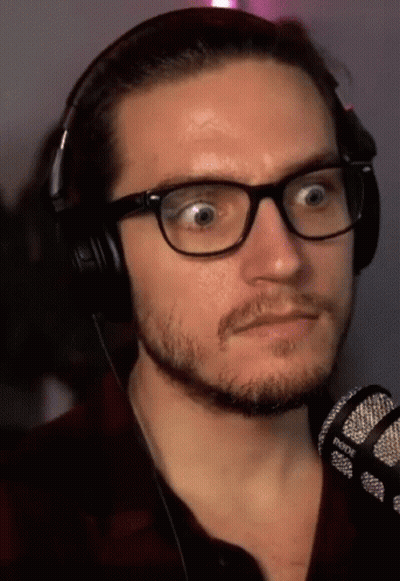 Man With Glasses And Headphones Making Funny Face GIF