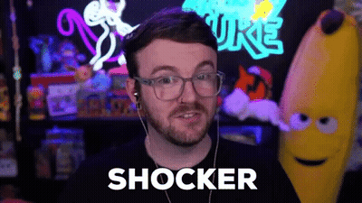Man With Glasses And Headphones Says Shocker GIF