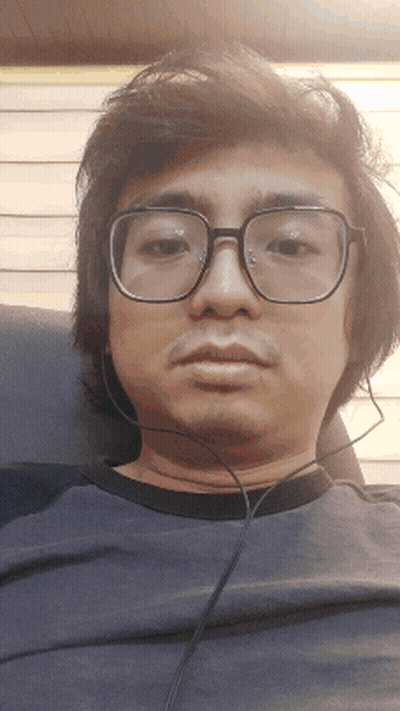 Man With Glasses And Headphones Sitting GIF
