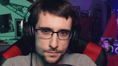 Man With Glasses And Headphones Sitting Near Paw Print GIF