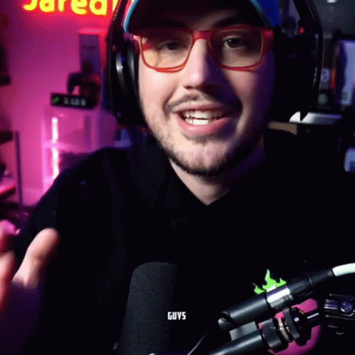 Man With Glasses And Headphones Smiling Saying Guys GIF
