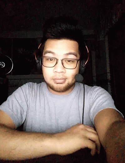Man With Glasses And Headphones Taking Selfie GIF